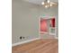 Living room featuring hardwood floors, neutral paint, and a view of the adjacent room at 8217 Ashkum Ave, Las Vegas, NV 89149