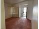 Cozy living area with sunlit windows and tile flooring, creating a versatile space for relaxing at 8419 W Rochelle Ave, Las Vegas, NV 89147
