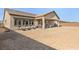 Backyard featuring an open patio with ample space for outdoor furniture and entertainment at 8575 Nicholas James Ave, Las Vegas, NV 89143