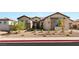 Charming single story home featuring stone accents and desert landscaping in a vibrant neighborhood at 8575 Nicholas James Ave, Las Vegas, NV 89143