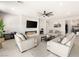 Spacious living room with a modern fireplace, large TV, and comfortable seating for Gathering gatherings at 8575 Nicholas James Ave, Las Vegas, NV 89143