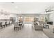 Bright, open floorplan features a spacious living area with views of the kitchen and backyard at 8575 Nicholas James Ave, Las Vegas, NV 89143