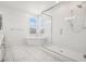 Modern bathroom with soaking tub and glass enclosed shower at 8591 Cloudy Dawn Way, Las Vegas, NV 89113