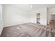 Bright bedroom with plush carpet and closet access at 8591 Cloudy Dawn Way, Las Vegas, NV 89113