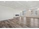 Open living space featuring a modern fireplace, recessed lighting, and large windows for natural light at 8591 Cloudy Dawn Way, Las Vegas, NV 89113