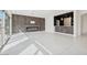 Bright living room with fireplace, bar, and sliding doors at 8591 Cloudy Dawn Way, Las Vegas, NV 89113