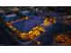 Aerial view highlights the home's curb appeal, lush landscaping, pool, and outdoor entertaining areas at 9117 Hickam Ave, Las Vegas, NV 89129