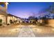 Gorgeous backyard with a pool, mature landscaping, and a paved patio area at 9117 Hickam Ave, Las Vegas, NV 89129