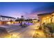 Resort-style backyard featuring a pool, spa, and a cozy fire pit area, perfect for outdoor relaxation at 9117 Hickam Ave, Las Vegas, NV 89129