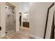 Bathroom with a walk-in shower, a sink with vanity and a walk-in closet at 9117 Hickam Ave, Las Vegas, NV 89129