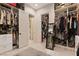 Spacious walk-in closet with custom shelving and ample storage for clothes and accessories at 9117 Hickam Ave, Las Vegas, NV 89129