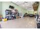 Large garage featuring epoxy floors, storage, shelving and lots of space at 9117 Hickam Ave, Las Vegas, NV 89129