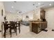 An open floor plan featuring stylish dining area and a cozy living room, perfect for entertaining and relaxation at 9117 Hickam Ave, Las Vegas, NV 89129