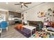 Cozy living room with modern furnishings and adjacent open kitchen area at 9117 Hickam Ave, Las Vegas, NV 89129