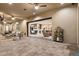 Back patio featuring multiple seating areas with indoor/outdoor living concept at 9117 Hickam Ave, Las Vegas, NV 89129