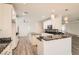 Beautiful white kitchen with marble countertops and stainless steel appliances at 10235 Tresor Ct, Las Vegas, NV 89135