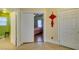 View into bedroom showcasing neutral paint, wood flooring and abundant natural light at 10450 Kepler Cascades St, Las Vegas, NV 89141
