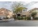 Charming two-story home with a landscaped front yard and a well-manicured lawn at 10450 Kepler Cascades St, Las Vegas, NV 89141
