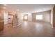 Spacious living room with tile flooring, adjoining the kitchen, ideal for entertaining and Gathering time at 10643 Petricola St # 103, Las Vegas, NV 89183