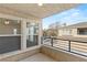 Balcony with views of neighboring buildings and a nearby street at 10730 Amber Ridge Dr # 205, Las Vegas, NV 89144