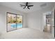 Neutral bedroom featuring pool views and sliding glass door access at 11185 Black Fire Opal Dr, Las Vegas, NV 89138