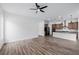 Spacious open-concept living area with views into the kitchen with stainless steel appliances at 11185 Black Fire Opal Dr, Las Vegas, NV 89138