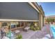 Relaxing covered patio, ideal for outdoor living with pool view at 11185 Black Fire Opal Dr, Las Vegas, NV 89138