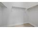 A bright walk-in closet features shelving for ample storage and plush carpeting at 11185 Black Fire Opal Dr, Las Vegas, NV 89138