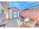 Cozy backyard patio with shed featuring decorative stars and outdoor seating at 1120 Mariposa Way, Boulder City, NV 89005
