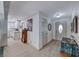 Bright foyer with wood-look floors leading to kitchen and living areas at 1120 Mariposa Way, Boulder City, NV 89005