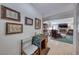 Cozy entry area with art and furniture, leading to a spacious living room at 1120 Mariposa Way, Boulder City, NV 89005