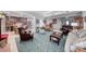 Spacious living room flows to dining and kitchen areas with plenty of seating options at 1120 Mariposa Way, Boulder City, NV 89005