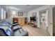 Inviting living room features wood-look floors, a comfy couch, and bright light at 1120 Mariposa Way, Boulder City, NV 89005