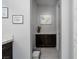 Charming bathroom featuring a stylish vanity with a marble countertop and contemporary decor at 13 Porto Malaga St, Henderson, NV 89011