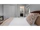 Bedroom with a cozy bed and view of a bathroom at 13 Porto Malaga St, Henderson, NV 89011