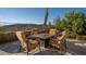 Outdoor patio area with comfortable seating and a stunning mountain view at 13 Porto Malaga St, Henderson, NV 89011