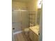 Bathroom showcases a shower, toilet, vanity, and shelving for storage at 1607 Colloquium Dr # 0, Henderson, NV 89014