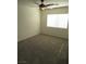 Comfortable bedroom with new carpet, ceiling fan, and window providing natural light at 1607 Colloquium Dr # 0, Henderson, NV 89014