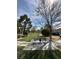 Common green area with picnic tables and trees at 1607 Colloquium Dr # 0, Henderson, NV 89014