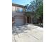 Charming two-story home with a front yard, desert landscaping, and an attached garage at 1607 Colloquium Dr # 0, Henderson, NV 89014