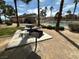 Community grill and picnic table near clubhouse and community pool at 1607 Colloquium Dr # 0, Henderson, NV 89014
