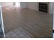 Bright living room with a cozy fireplace and light-colored floors at 1607 Colloquium Dr # 0, Henderson, NV 89014