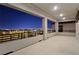 This covered balcony features night city views of the Las Vegas area at 180 Native Stone St, Las Vegas, NV 89138