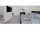 Bedroom with a dresser and mirror, and a view leading to the bathroom at 180 Native Stone St, Las Vegas, NV 89138