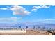 Enjoy breathtaking views of the Las Vegas skyline from this home's vantage point at 180 Native Stone St, Las Vegas, NV 89138
