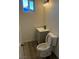 Cozy bathroom featuring new vanity, toilet, and lighting at 2036 Canosa Ave, Las Vegas, NV 89104