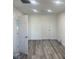 Bright, spacious bedroom with laminate floors and closet at 2036 Canosa Ave, Las Vegas, NV 89104