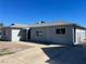 Single-story home with light grey stucco and concrete driveway at 2036 Canosa Ave, Las Vegas, NV 89104