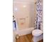 Bright bathroom featuring a shower-tub combination with a blue seashell-themed curtain at 2048 Mesquite Ln # 303, Laughlin, NV 89029