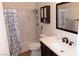 The bathroom features a shower with seahorse curtain and upgraded vanity, creating a fresh and functional space at 2048 Mesquite Ln # 303, Laughlin, NV 89029